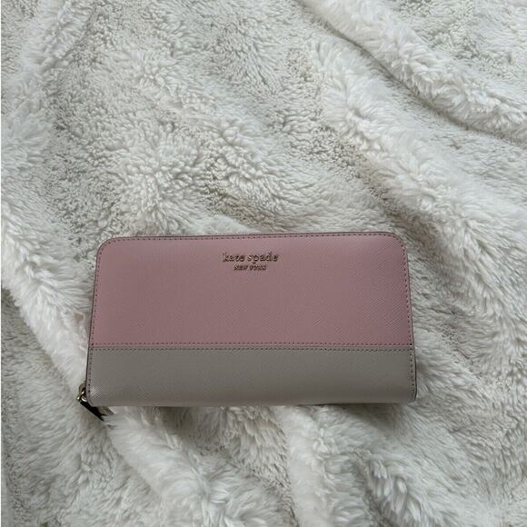 kate spade Handbags - Kate Spade Round Zipper‎ Pink Leather Wallet
